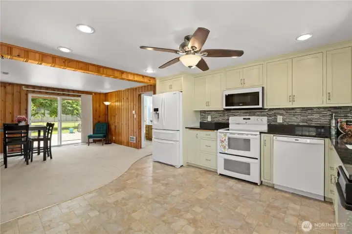 Updated kitchen flows into dining room Updated kitchen flows into dining room