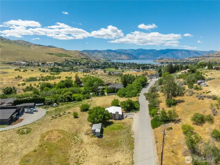 It sits on 1.31 acres. with an additional available .69 acres directly across the street at an additional price.