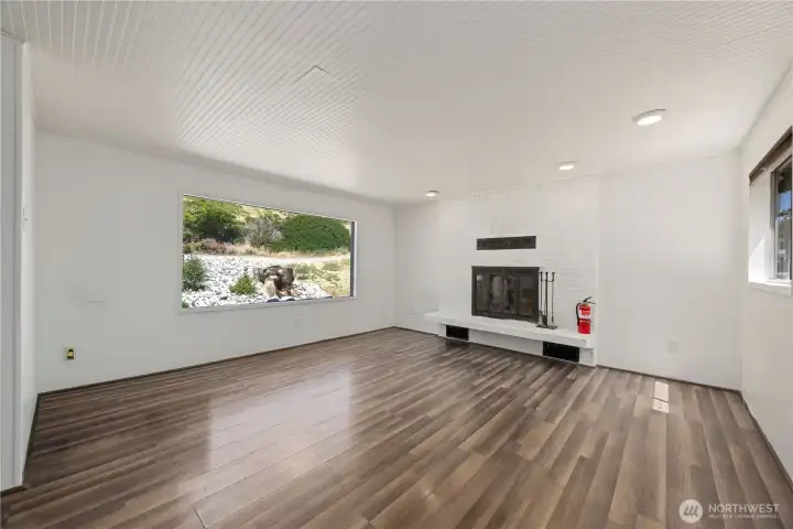 Laminate floors and freshly painted walls provide for this move in ready cottage.