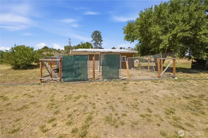 Back fenced in area for pets.