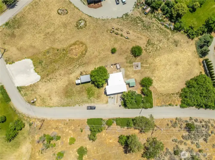 1.31. Ac. with the possibility of an additional .69 ac across the street for only $100,000.