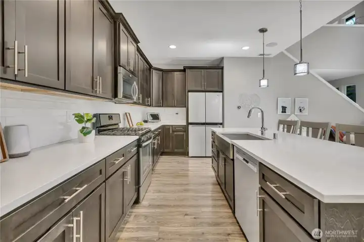 Extensive quartz countertops. Refrigerator does not convey. All other appliances stay. Extensive quartz countertops. Refrigerator does not convey. All other appliances stay.
