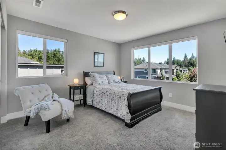 One of four upstairs bedrooms in addition to the primary. closet to the left of photo. One of four upstairs bedrooms in addition to the primary. closet to the left of photo.