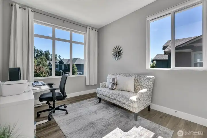 Another upstairs bedroom, currently used as an office; walk-in closet to the right of the photo Another upstairs bedroom, currently used as an office; walk-in closet to the right of the photo