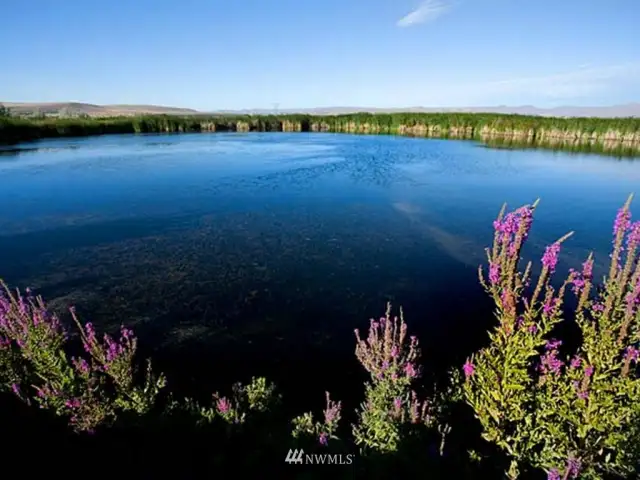 One of Three Lakes.   60 acres of water!!  Irrigation is possible out of Hilltop lake via a M & I contract with the Bureau of Reclamation.  Municipal water rights are available for purchase and transfer.