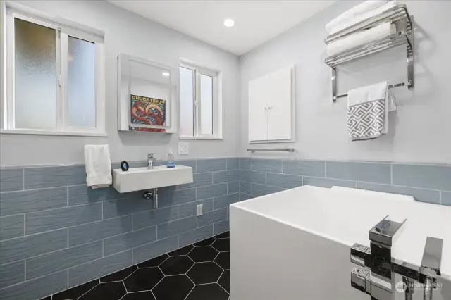 Remodeled Primary bathroom with heated floors.
