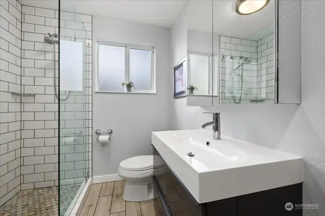 Remodeled bathroom with heated floors and towel rack!