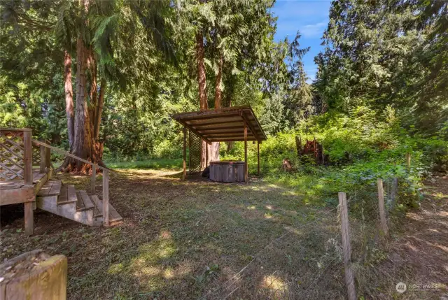 Off the back of the home is a fenced area with a gazebo, & hot tub (unsure if it is operational.) Stays with the home.