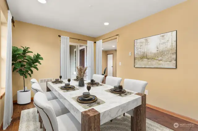 View of family room or Formal Dining room. Virtually Staged