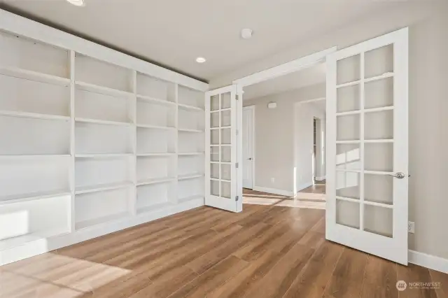 Office with french doors and built-ins on the main floor