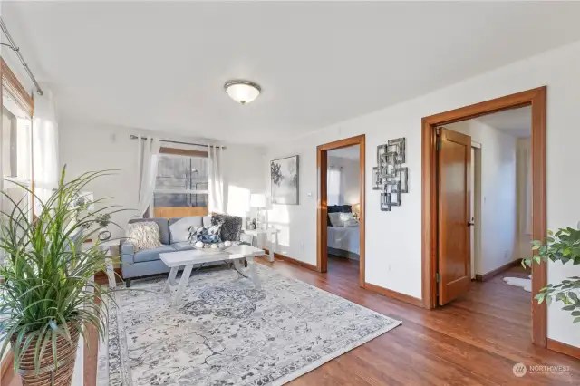 Living Room with 2 bedroom entrances.