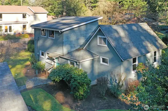 An aerial view of the front of the homeand second story space.