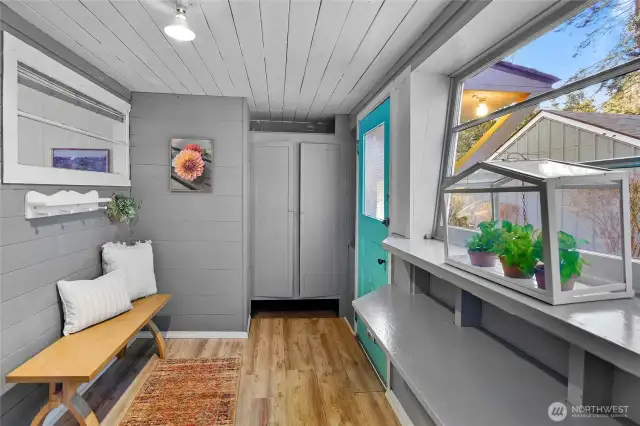 Welcoming entry/mudroom with plenty of built-in storage.