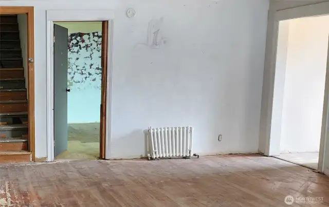 Living room, with front door off to the right