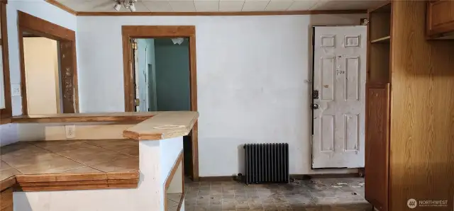 Looking through the kitchen into bedroom number 2