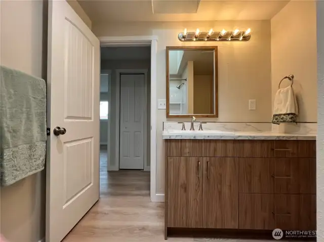 The spacious vanity in the main bath has good storage.