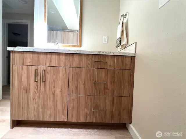 Main bath vanity has lot of storage