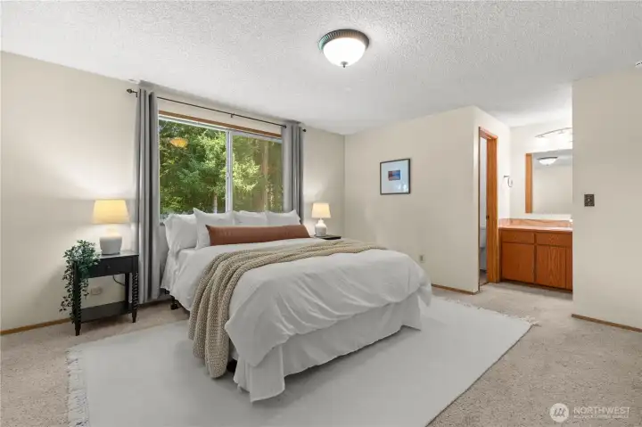 Primary bedroom looking towards primary bathroom