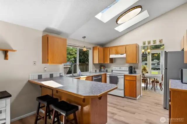 looking into kitchen from eating space