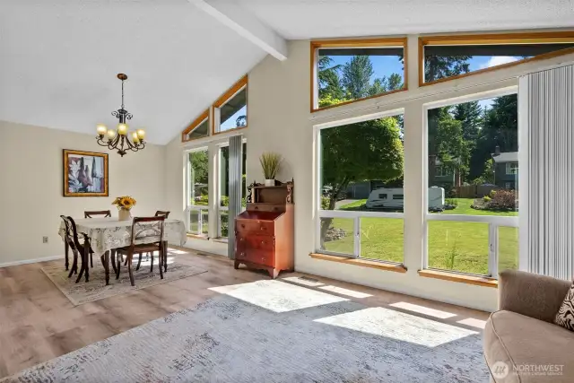 Looking into dining room and front yard from living room