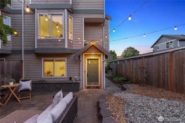 Over 400 square feet of patio and terrace space plus paver raised garden beds; additional garden space along wide side runner