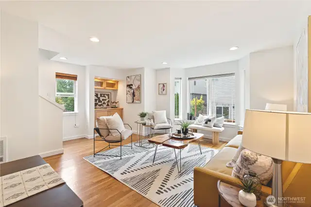 Windows on three sides, plus large neighboring, back, and kitty corner  allows for plenty of natural light on the second and third floors