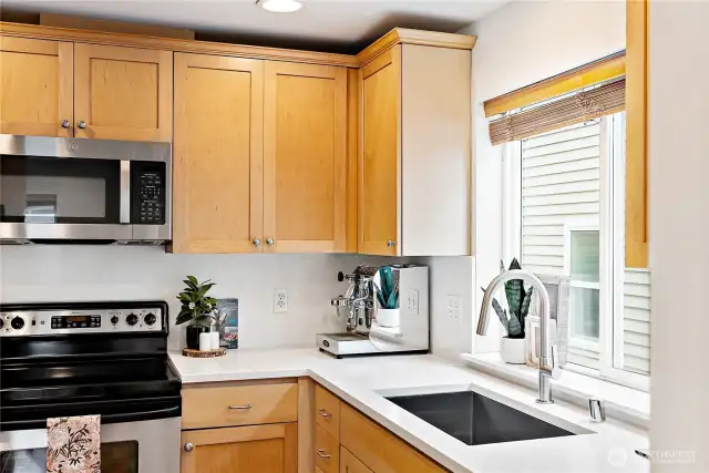 1 year new microwave, plus all new quartz countertops, backsplash,  undermount sink, and new faucet