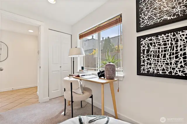 Third bedroom with peaceful patio views, additional storage closet
