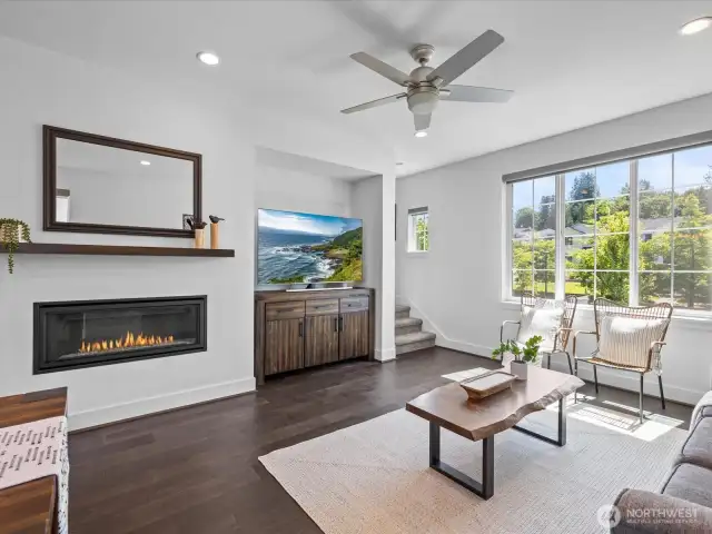 Features cozy gas fireplace, recessed nook for TV and accessories.