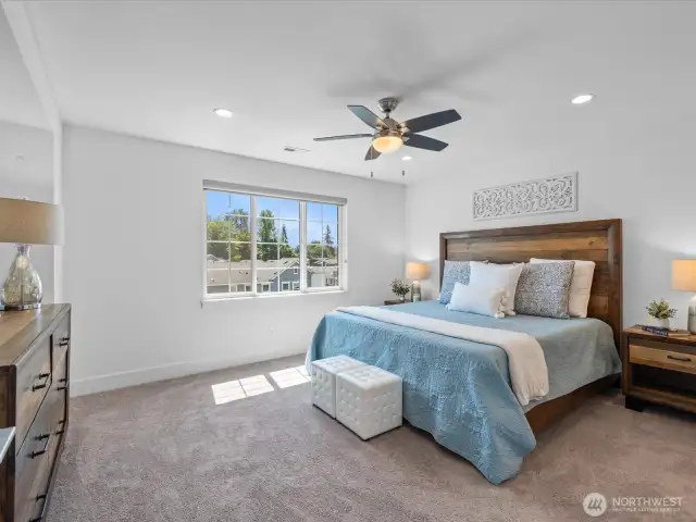 Spacious bedroom shown with King Sized bed