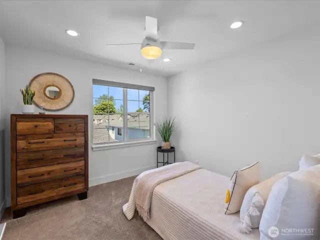 Secondary bedroom with sunset views.