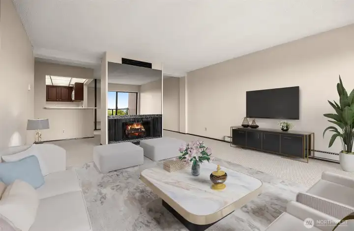 The warmth of home, framed by a stylish gas fireplace. Virtually Staged Photo.