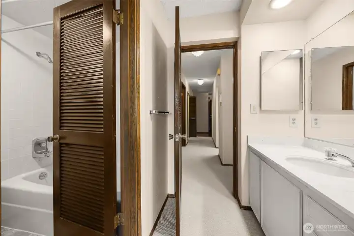 En-suite full bath offers convenience and privacy within the spacious bedroom retreat.