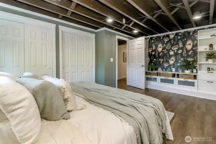 Double closets and built-in shelving and storage.