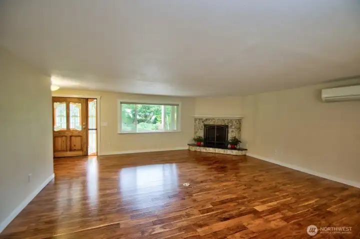 Another view of living room looking toward the front entrance!