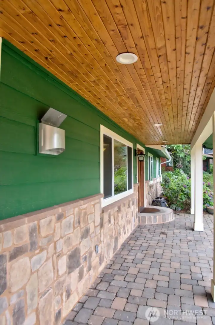 Covered front walk way from garage to front door.