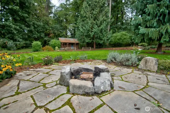Fire pit that offers lots of warmth and great conversations with friends and family.