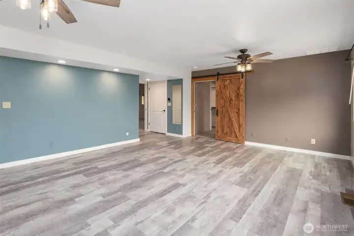 Dining Room leads to Family room, Primary Bedroom and Den