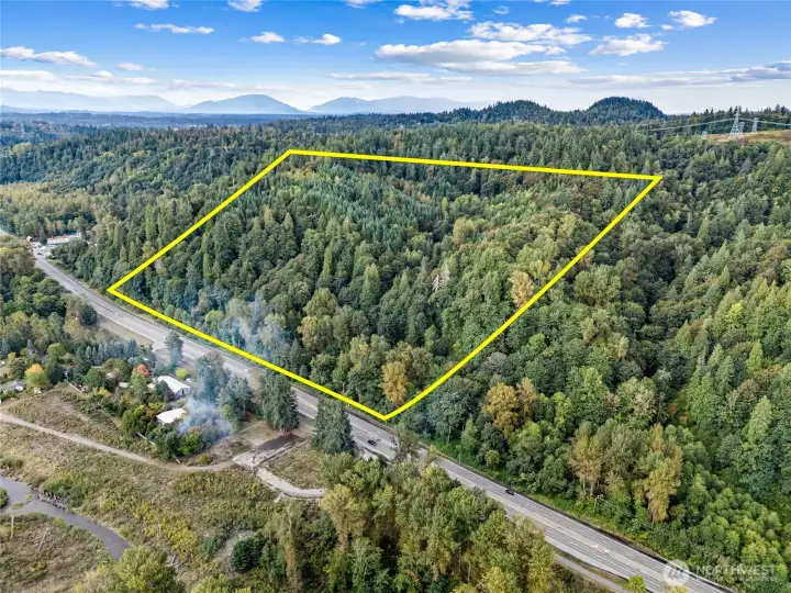 80 Acres along SR 169 Zoned RA5  Property lines are not accurate - approximation only