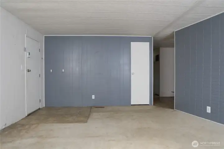 The entryway leads directly into a welcoming living room and includes a convenient coat closet for added storage and organization.