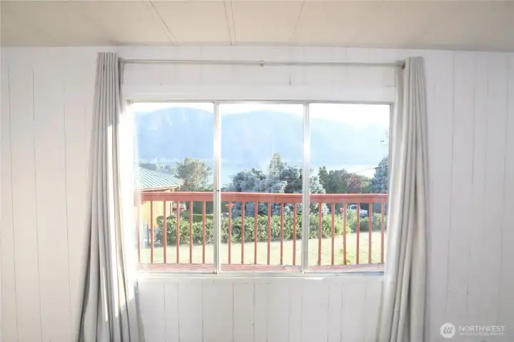 Enjoy clear views of the beautifully maintained front yard, offering a welcoming first impression and added outdoor charm and of course the stunning views of Lake Chelan.