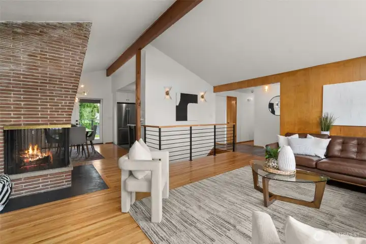 LOVE the angular fireplace, such a hallmark of the home's mid-century heritage. Fireplace is original; chimney was removed & entirely rebuilt in 2024 to ensure good condition for many years to come.