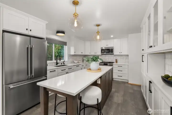Professionally designed for convenience and entertaining in style, this stunning kitchen (ALL new in 2022) is sure to inspire your best culinary creations.