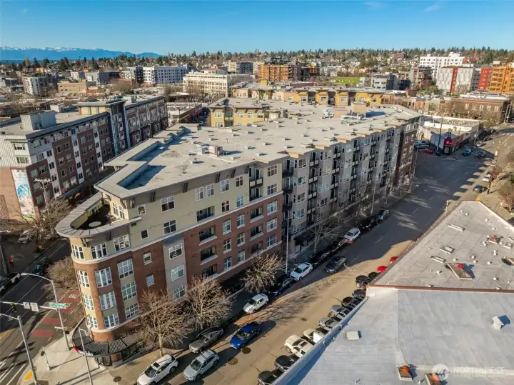 Perched atop Canal Station, this rare east-facing top-floor residence offers an elevated perspective on Ballard living.
