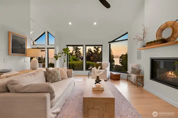 Anchoring the living area is an Xtrordinair gas fireplace—a striking yet cozy centerpiece that invites you to curl up and enjoy the ambiance, whether on crisp winter evenings or breezy coastal mornings.