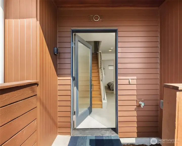 An Invitation to Style – A front door that opens to light, warmth, and sleek design.