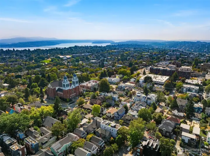 Minutes to Lake Washington, with sweeping neighborhood and mountain views beyond.