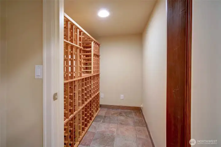Currently set for wine storage, but could be updated for a sauna, or additional storage.