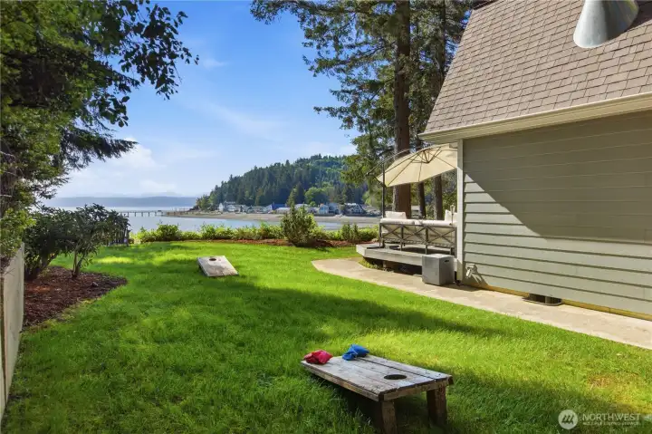 Side house view with gorgeous level lawn area