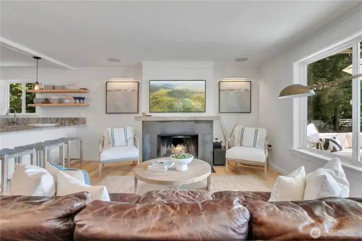 Great room is spacious and adjoins slider to expansive view deck